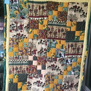 - Handmade Lap Quilt.   40” x 48”